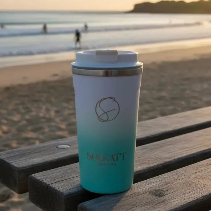 Ocean aqua reusable travel cup by the sea — stainless steel coffee mug made for coastal getaways.