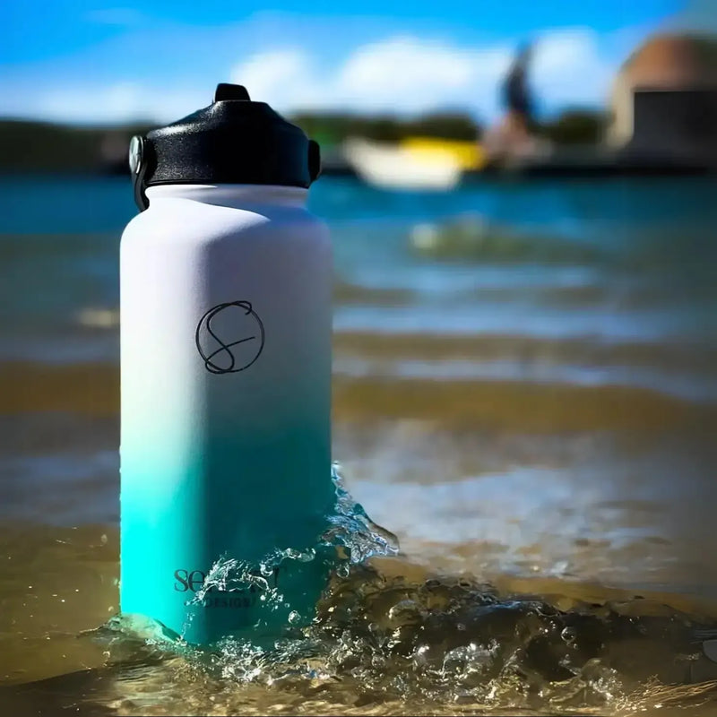 950ml (32oz) aqua water bottle at the beach Solkatt Designs