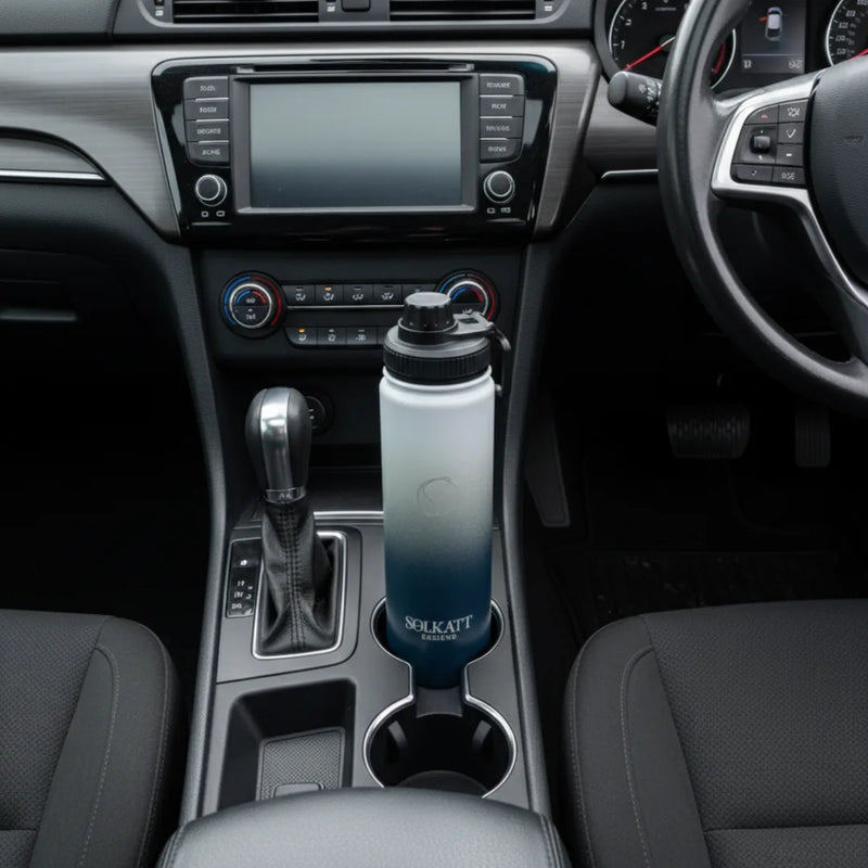 royal blue 650ml drink bottle sitting in a car cupholder - Solkatt Designs
