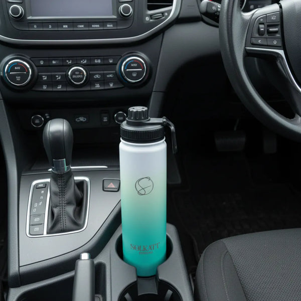 ocean aqua 650ml drink bottle sitting in a car cupholder - Solkatt Designs