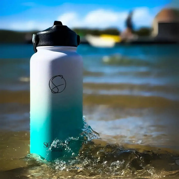 950ml (32oz) aqua water bottle at the beach Solkatt Designs