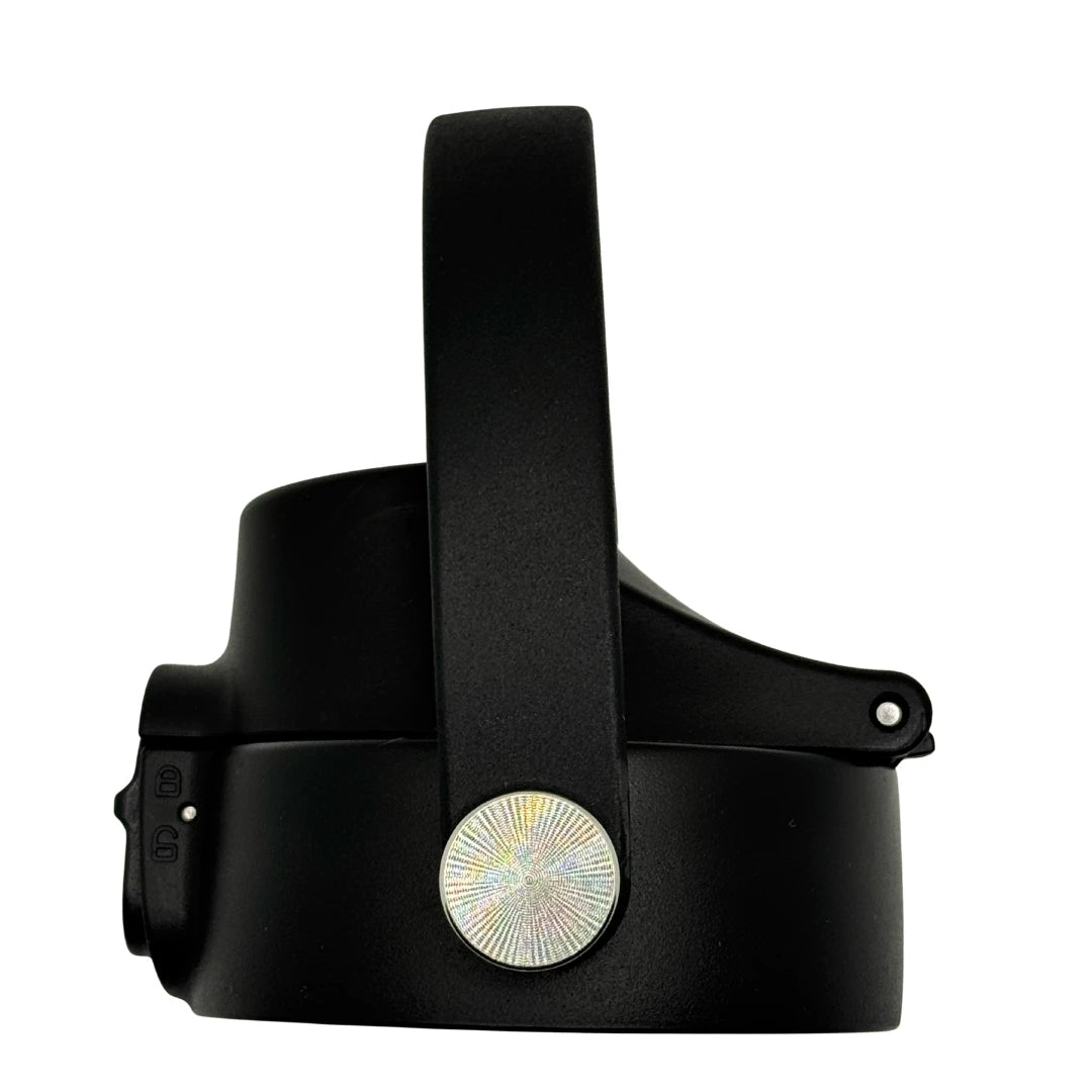 Side angle of a black solkatt designs drink bottle cap highlighting the locking mechanism and, BPA-free plastic construction.