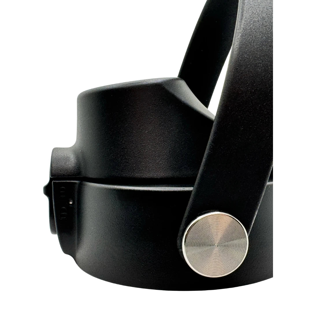 Side angle of a black Solkatt Designs drink bottle cap highlighting the sleek, BPA-free plastic construction and locking mechanism.