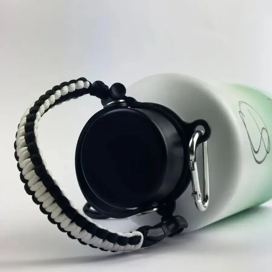 Black and white drink bottle paracord handle  with clip - Solkatt Designs