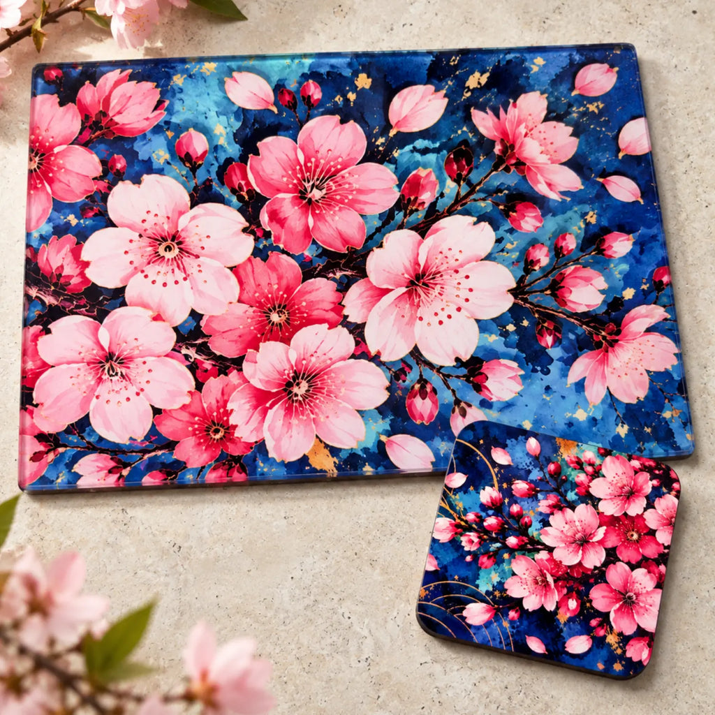 Sakura Afterglow glass chopping board paired with a matching cherry blossom drink coaster sitting on benchtop