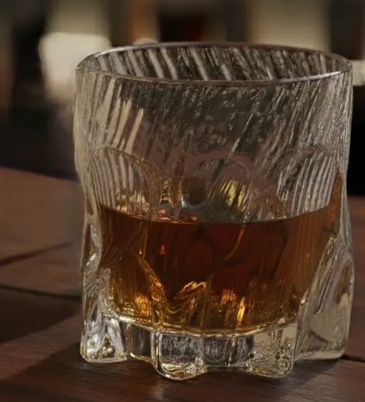 Close-up of Dragon Claw whisky glass showcasing the fine intricate  crystal detailing.