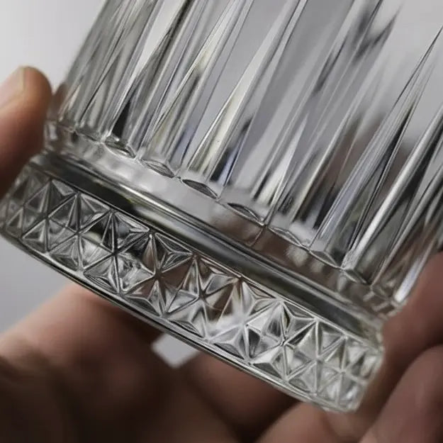 Crystal Ozoku whisky glass detail highlighting intricate carved pattern.