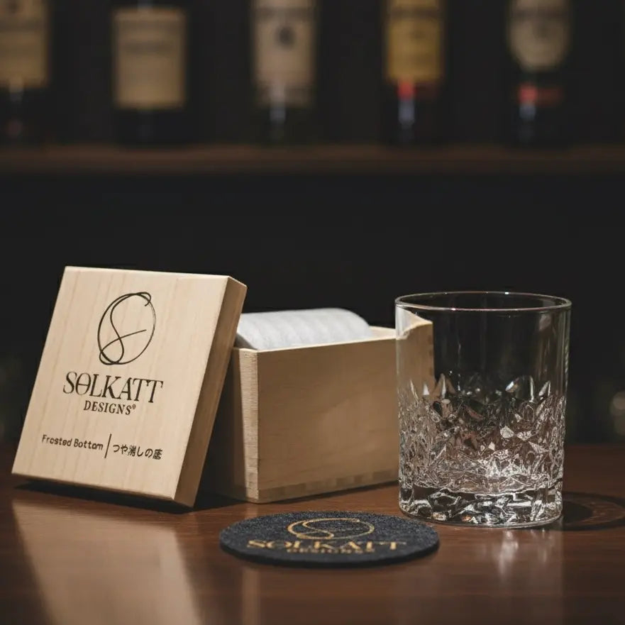 Frosted base whiskey glass styled as a gift idea, perfect for whisky lovers and special occasions.