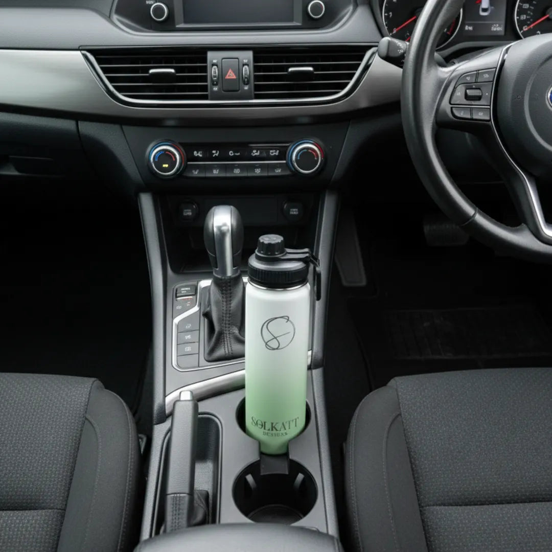 green 650ml drink bottle sitting in a car cupholder - Solkatt Designs