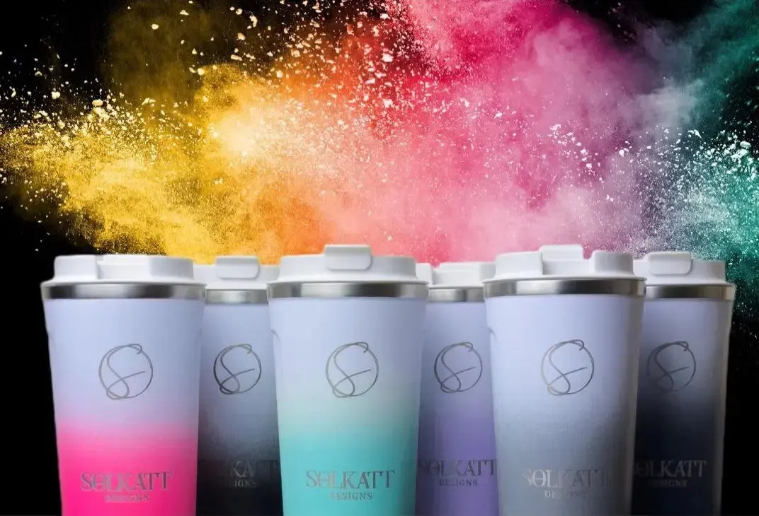 Gradient tumblers with SOLKATT logo against a colorful powder background