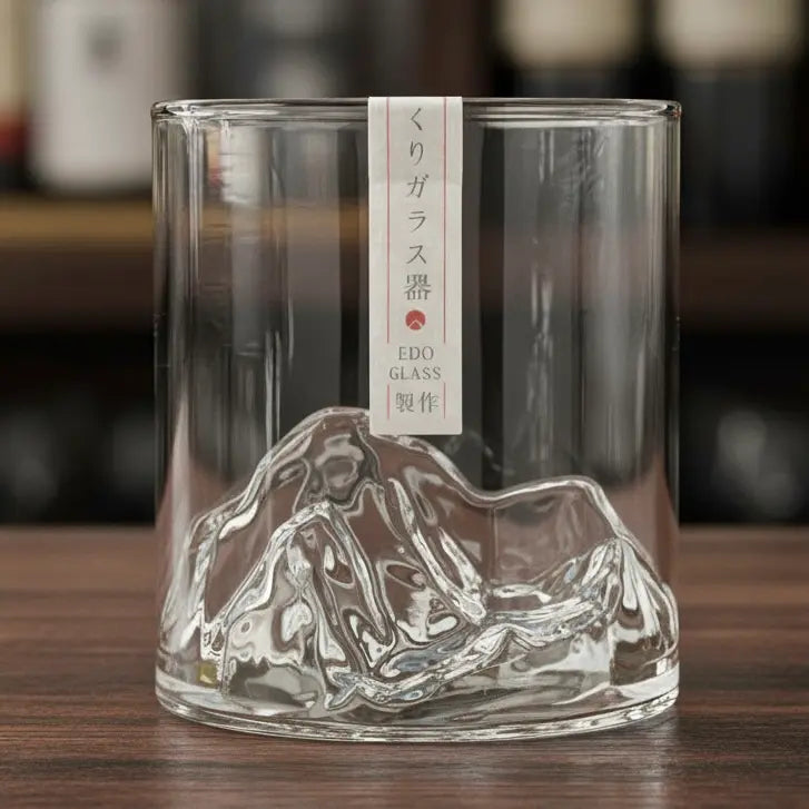 Japanese Mountain Whisky Glass empty on bar top, highlighting its sophisticated shape.