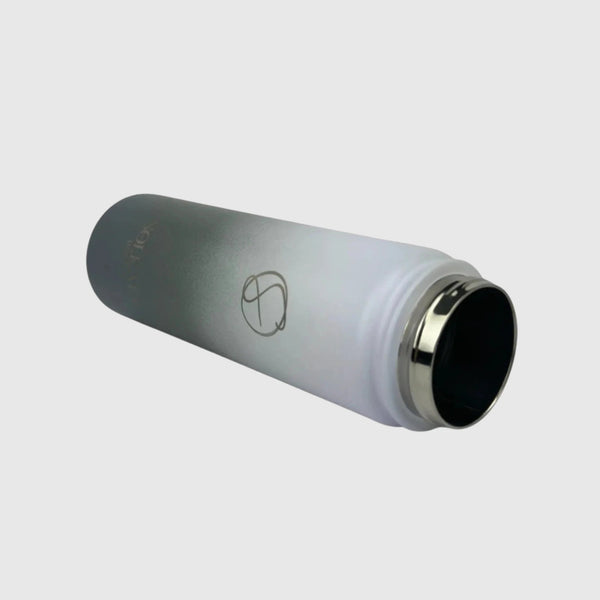 Misty Grey insulated water bottle laying on the side showing opening - 650ml - Solkatt Designs