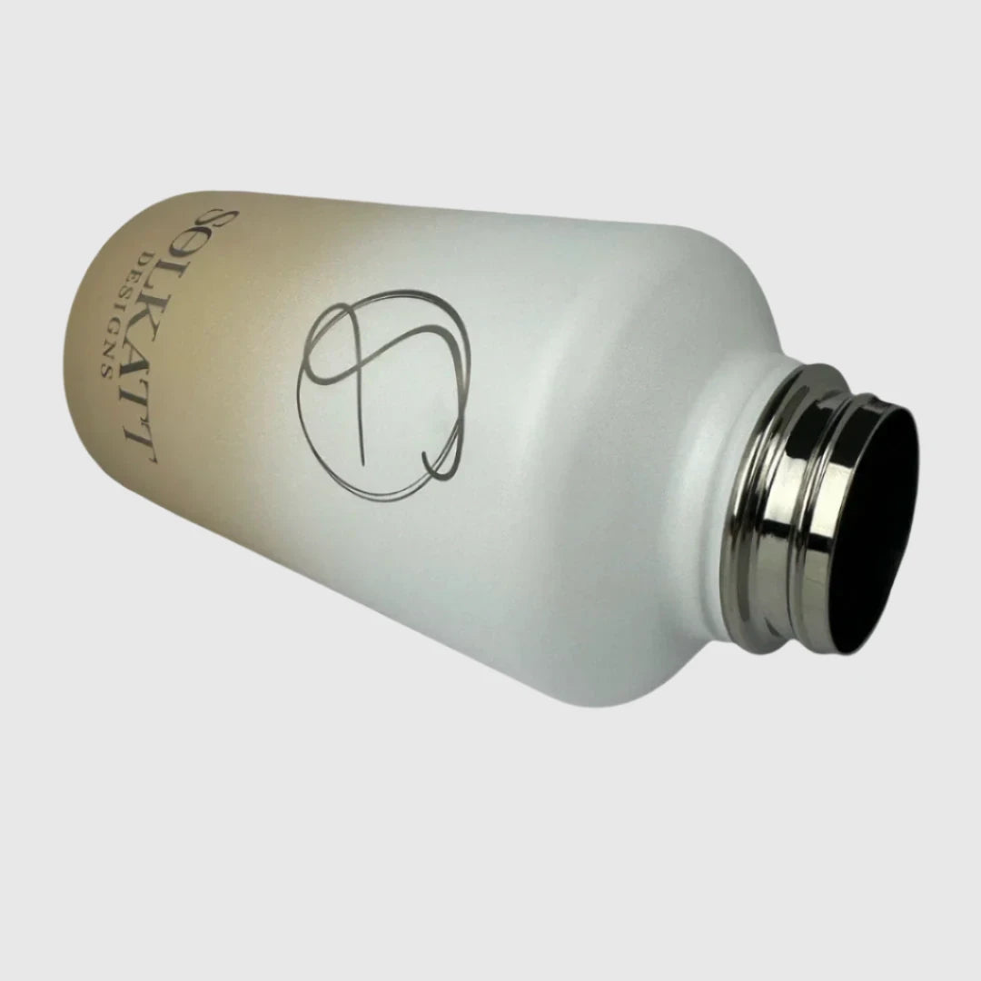 Pastel Beige insulated water bottle laying on the side showing opening - 1.9L (64oz) - Solkatt Designs