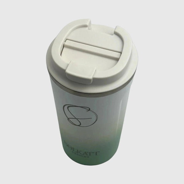 Top view close-up of Pastel Green coffee cup sip lid – Solkatt Designs