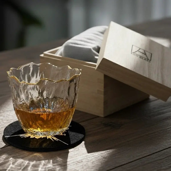 Sakura whisky glass gift set featuring a wooden box and matching drink coaster.