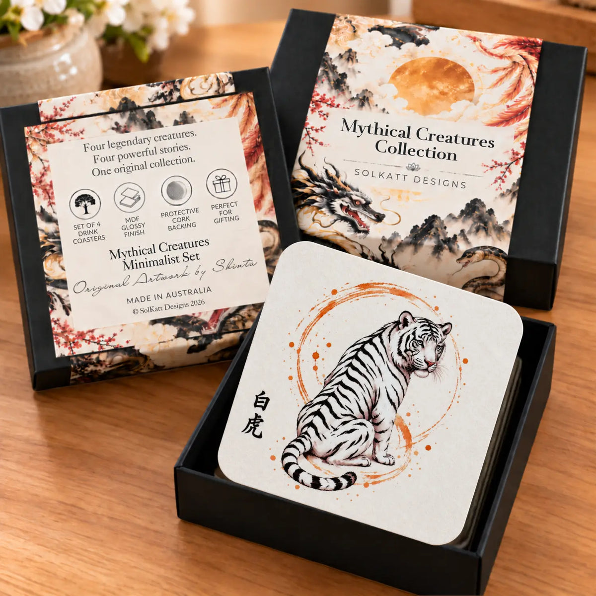 Minimalist japanese mythical creatures drink coaster presented in a black slide out gift box
